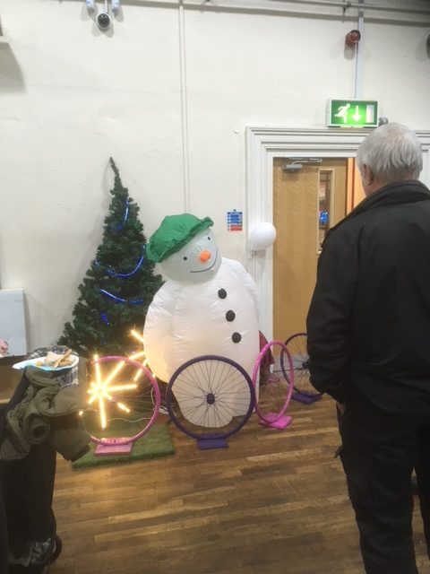 Pedal powered snowman at Landfill Christmas celebration event