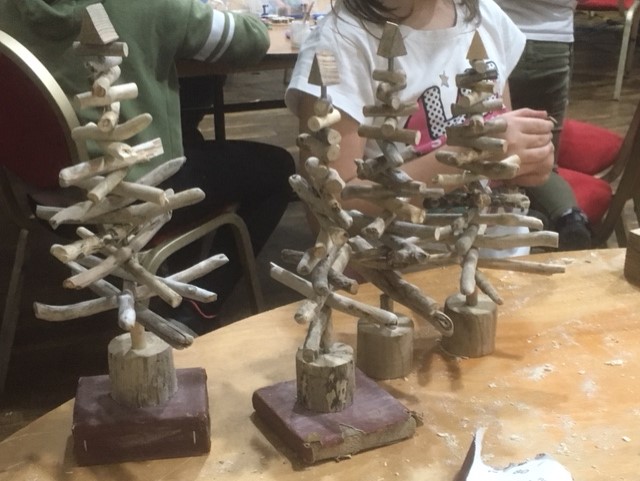 Driftwood christmas trees at Landfill Christmas celebration event